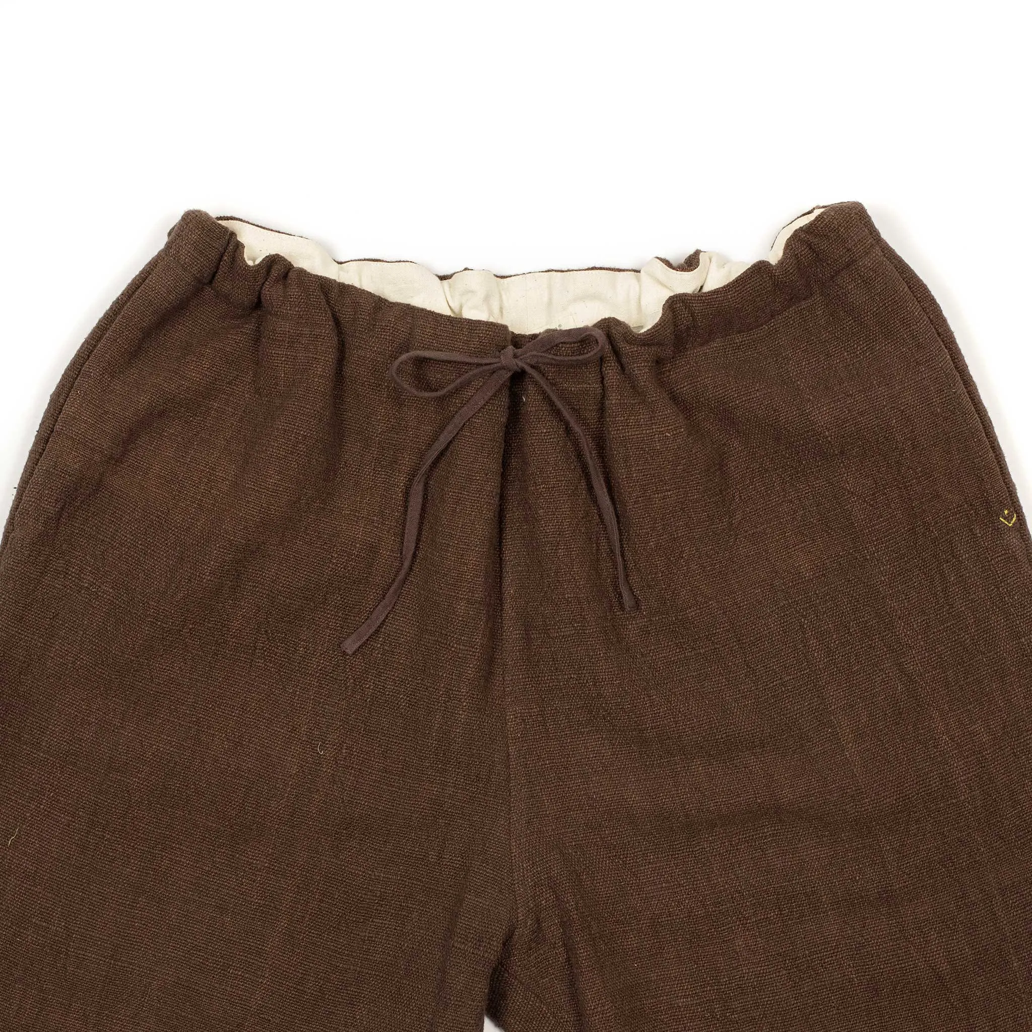 Drawstring tapered trousers in burnt umber cotton basketweave