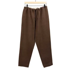 Drawstring tapered trousers in burnt umber cotton basketweave